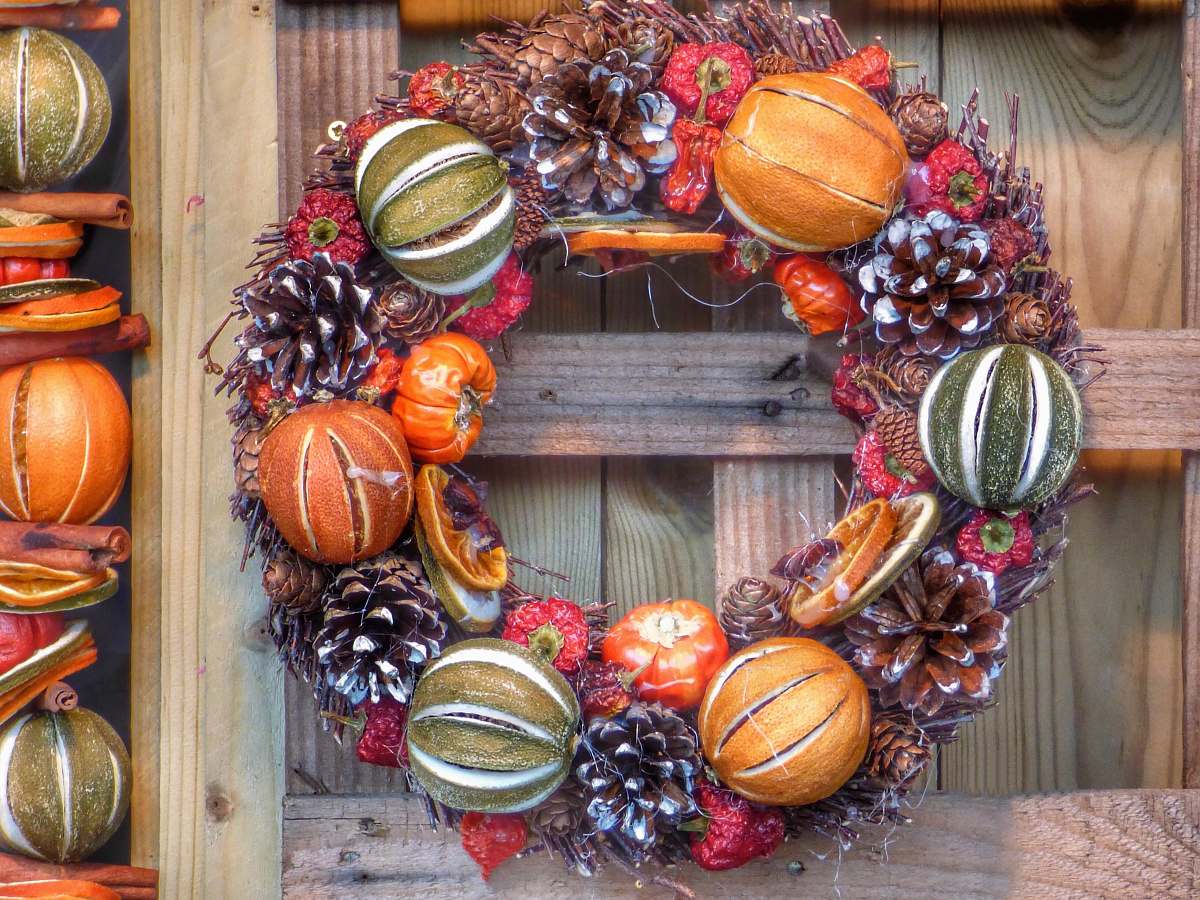 winchester closeup photo of brown, green, and maroon floral door wreath winchester cathedral