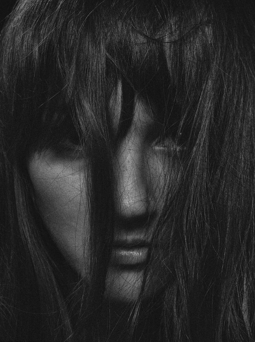 face greyscale photo of a woman person