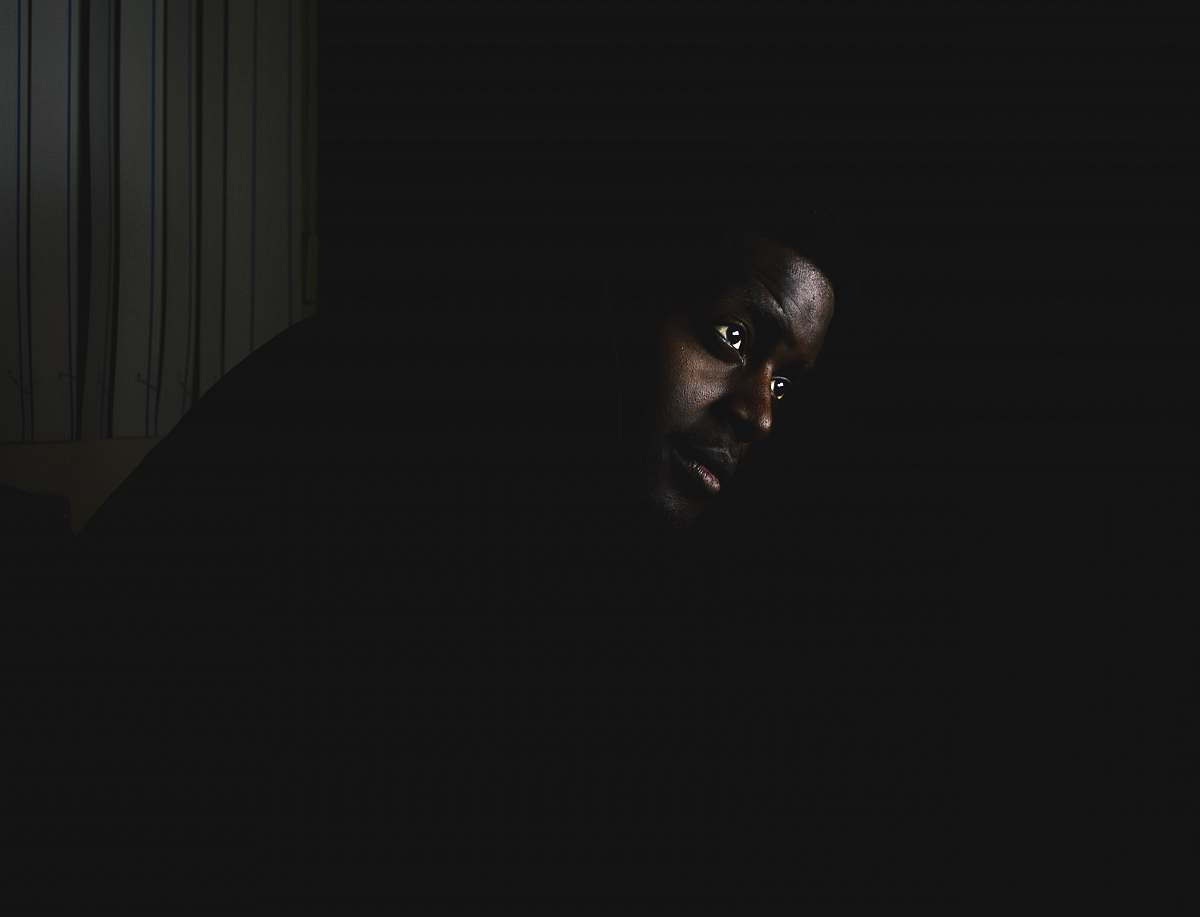portrait man in darkness black
