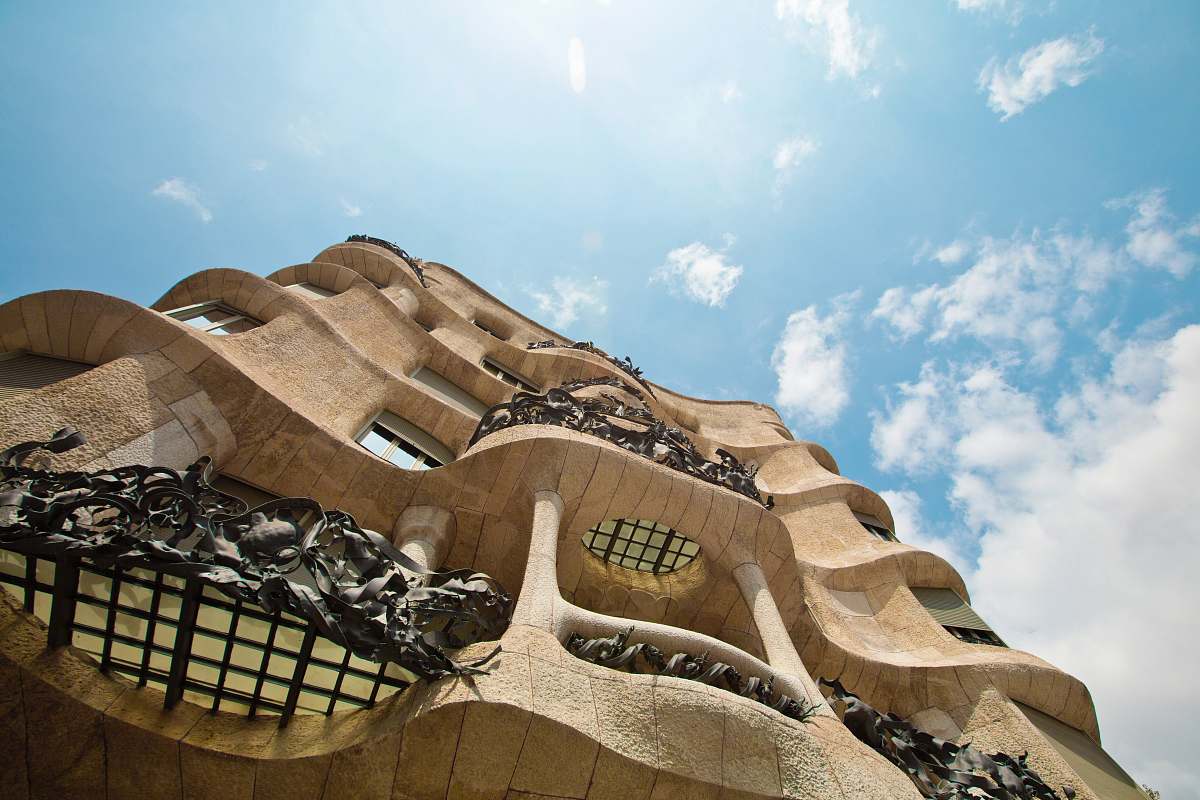 gaudi worms eye view photography of brown concrete structure blue