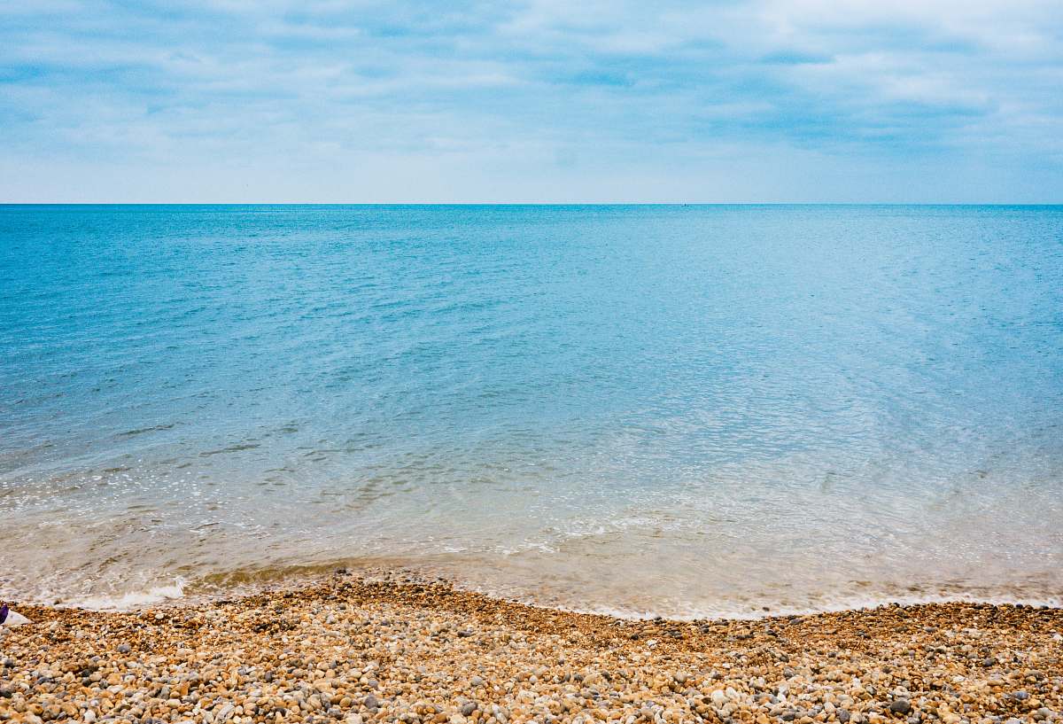 sea blue body of water under blue sky photography water