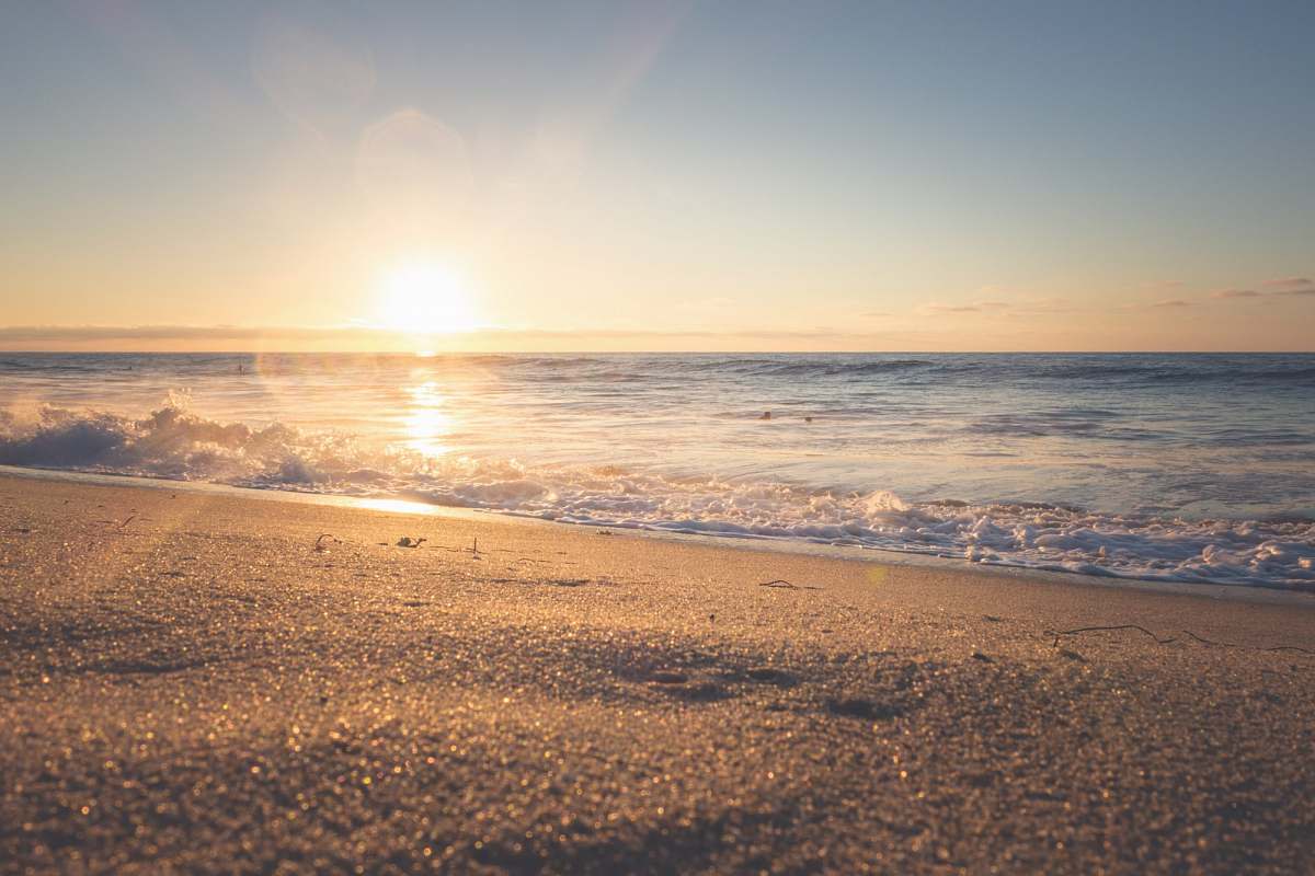 ocean photography of seashore during sunset sea
