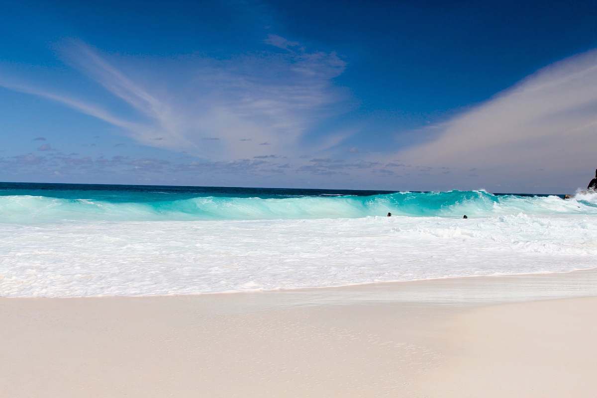 water seashore during daytime coast