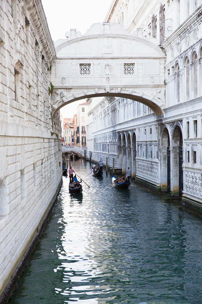 water canoe boats on body of water gondola