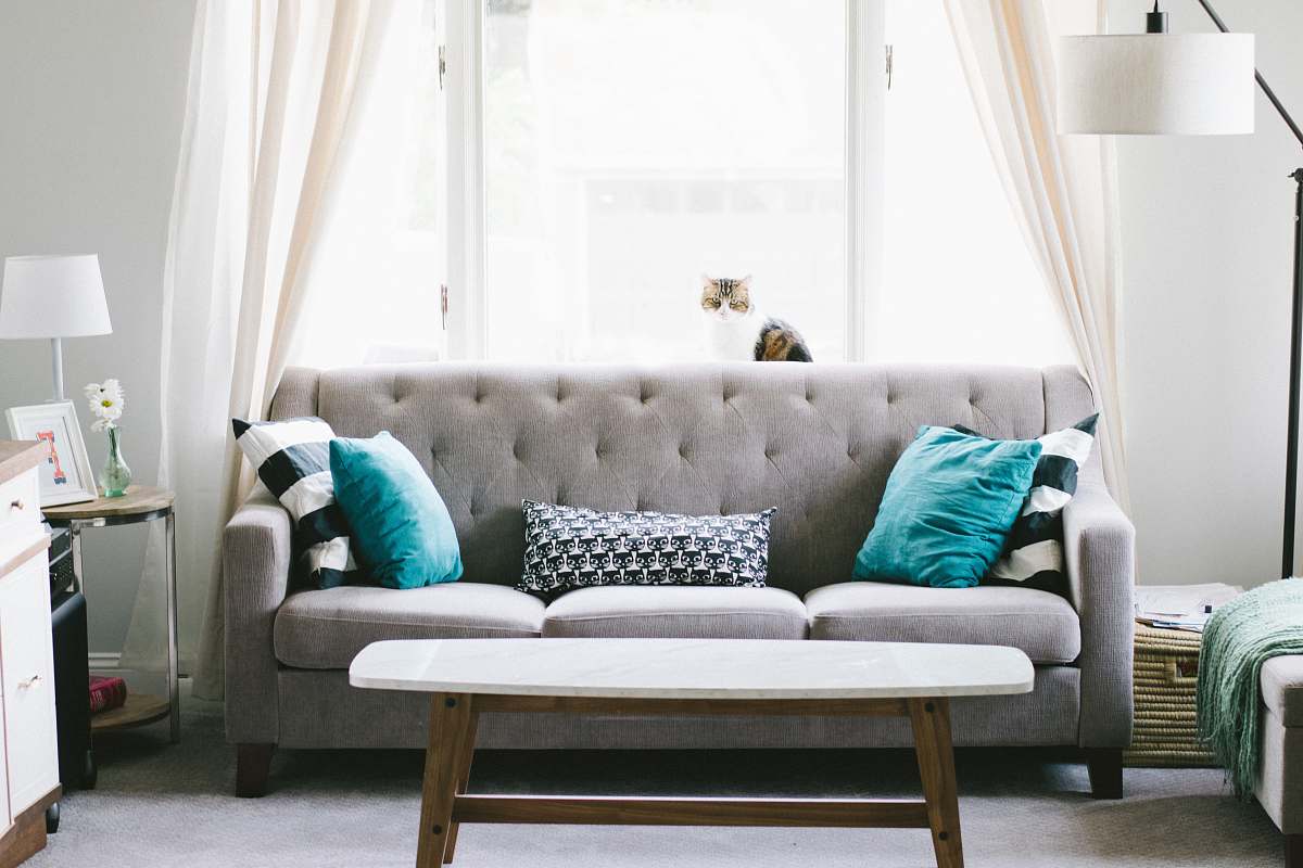 furniture brown and white wooden table beside sofa chair interior