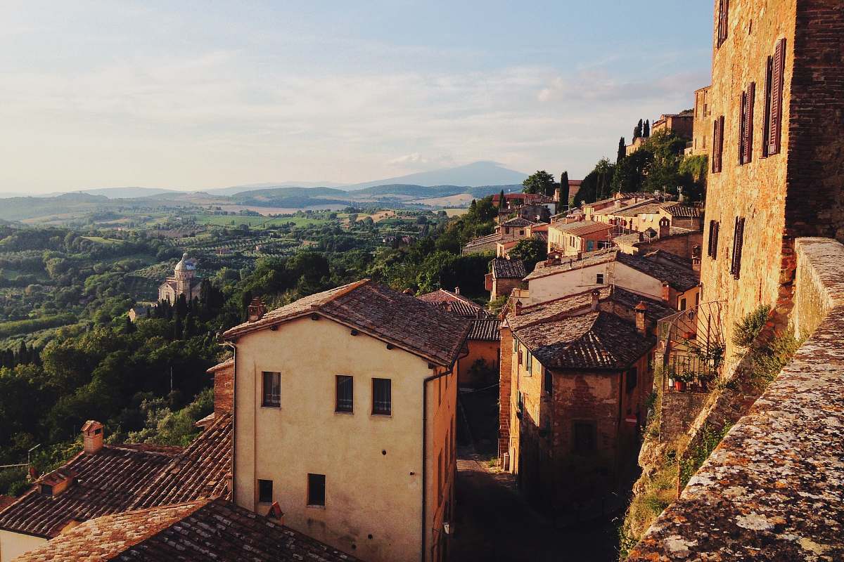 building brown concrete houses on mountain at daytime landscape