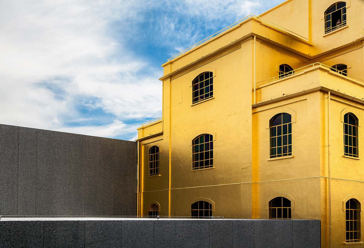 building brown painted house during daytime architecture