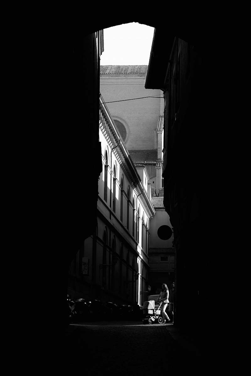 black-and-white grayscale photography of pathway bologna