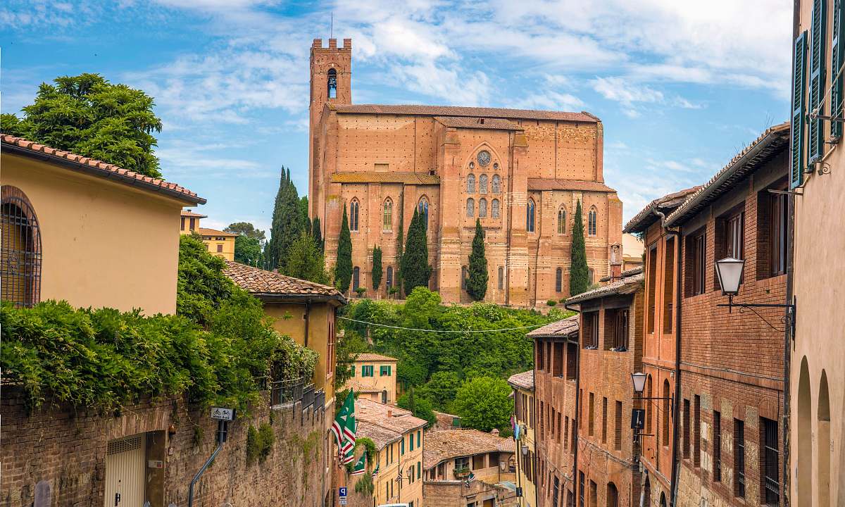 building landscape photography of village siena
