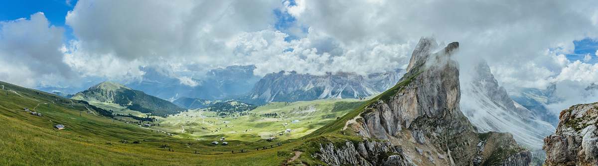 nature green and gray mountain under blue sky at daytime landscape