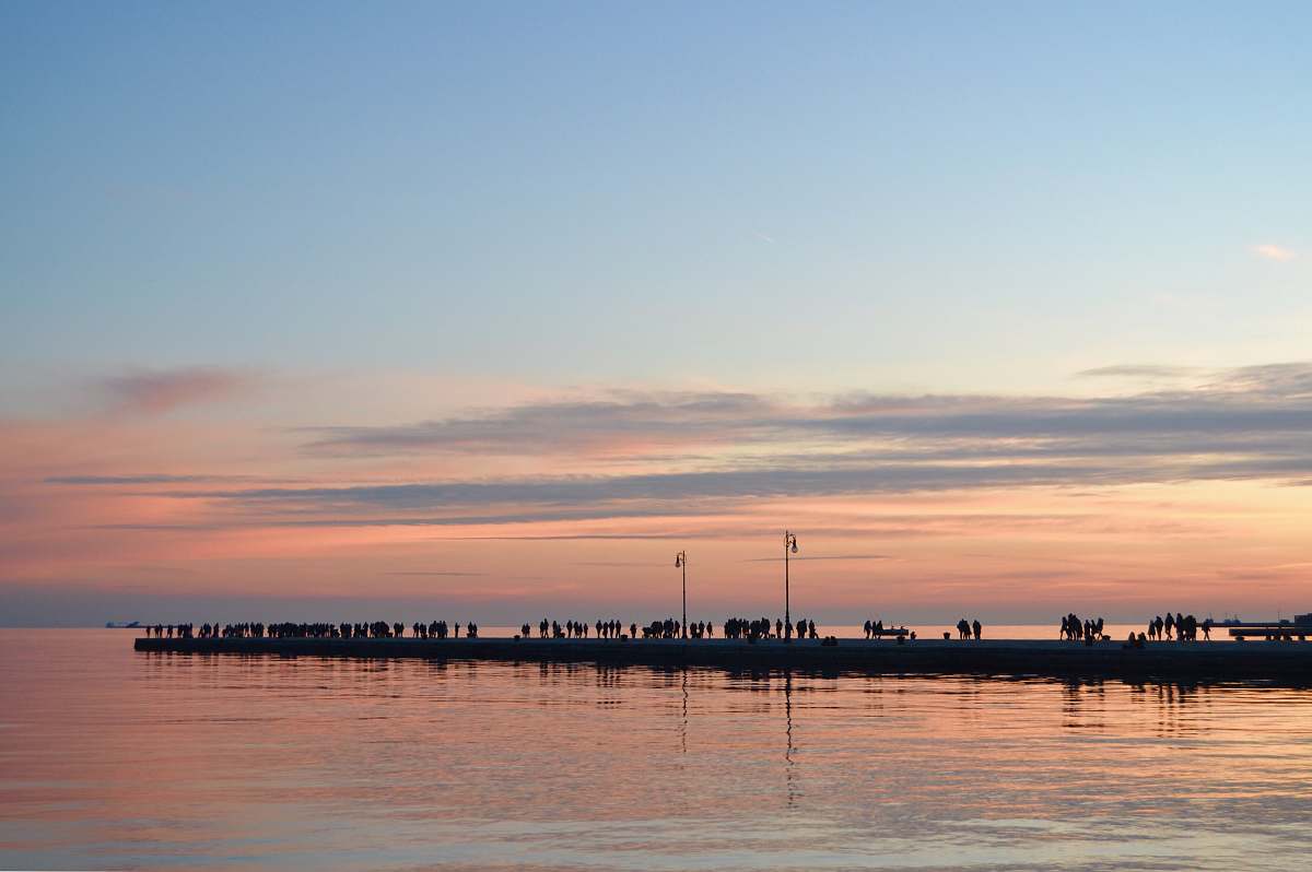 italy silhouette of trees above water photography sunset