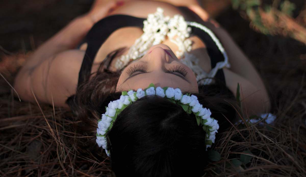 woman woman lying down on brown grass outdoor girl