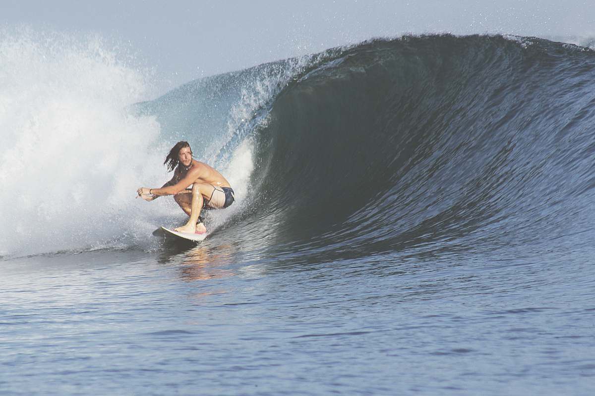 surfing man surfing with big wave ocean