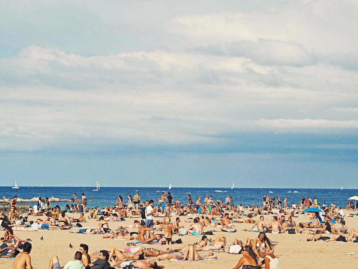 beach people on brown sand beach coast