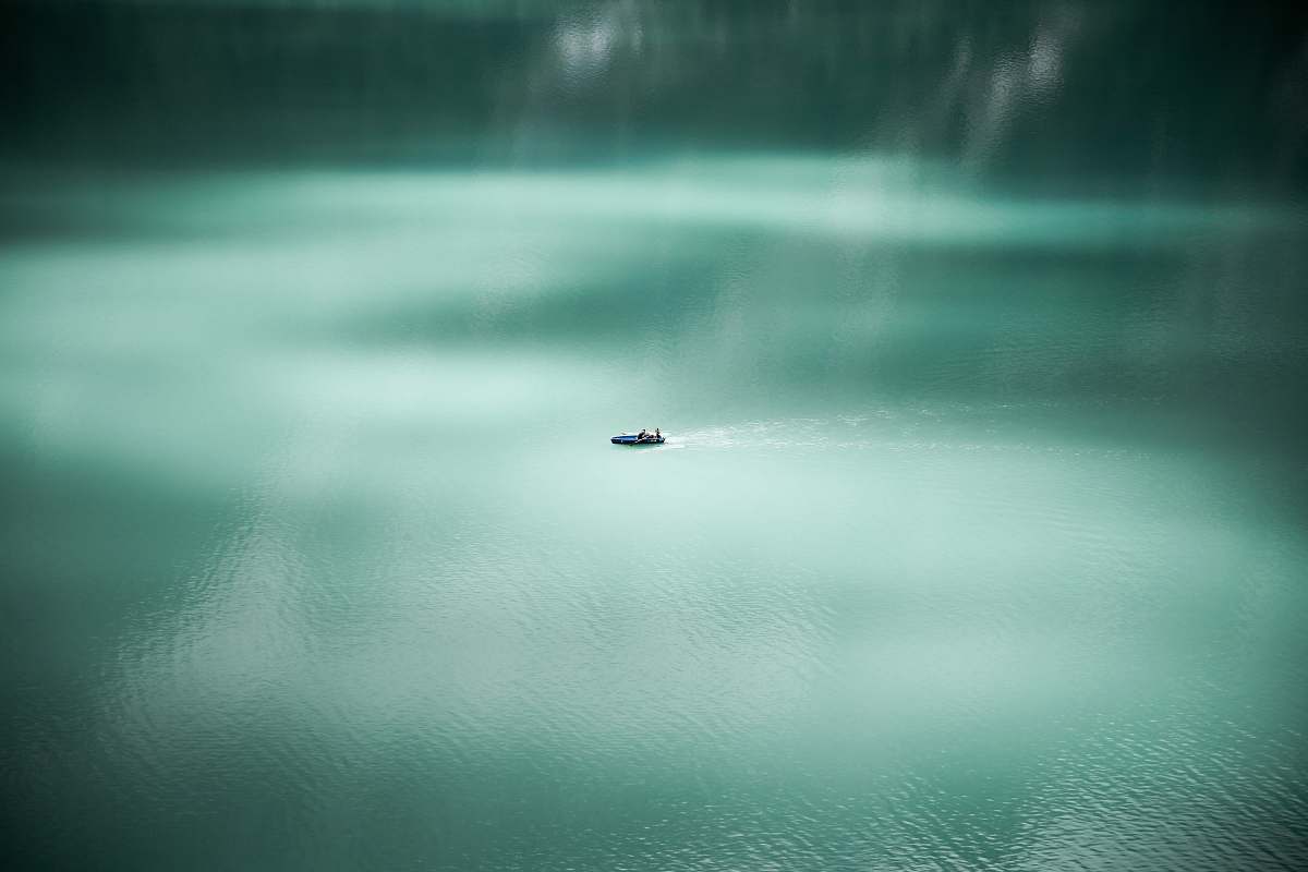 kandersteg aerial photography of sailing boat at sea water