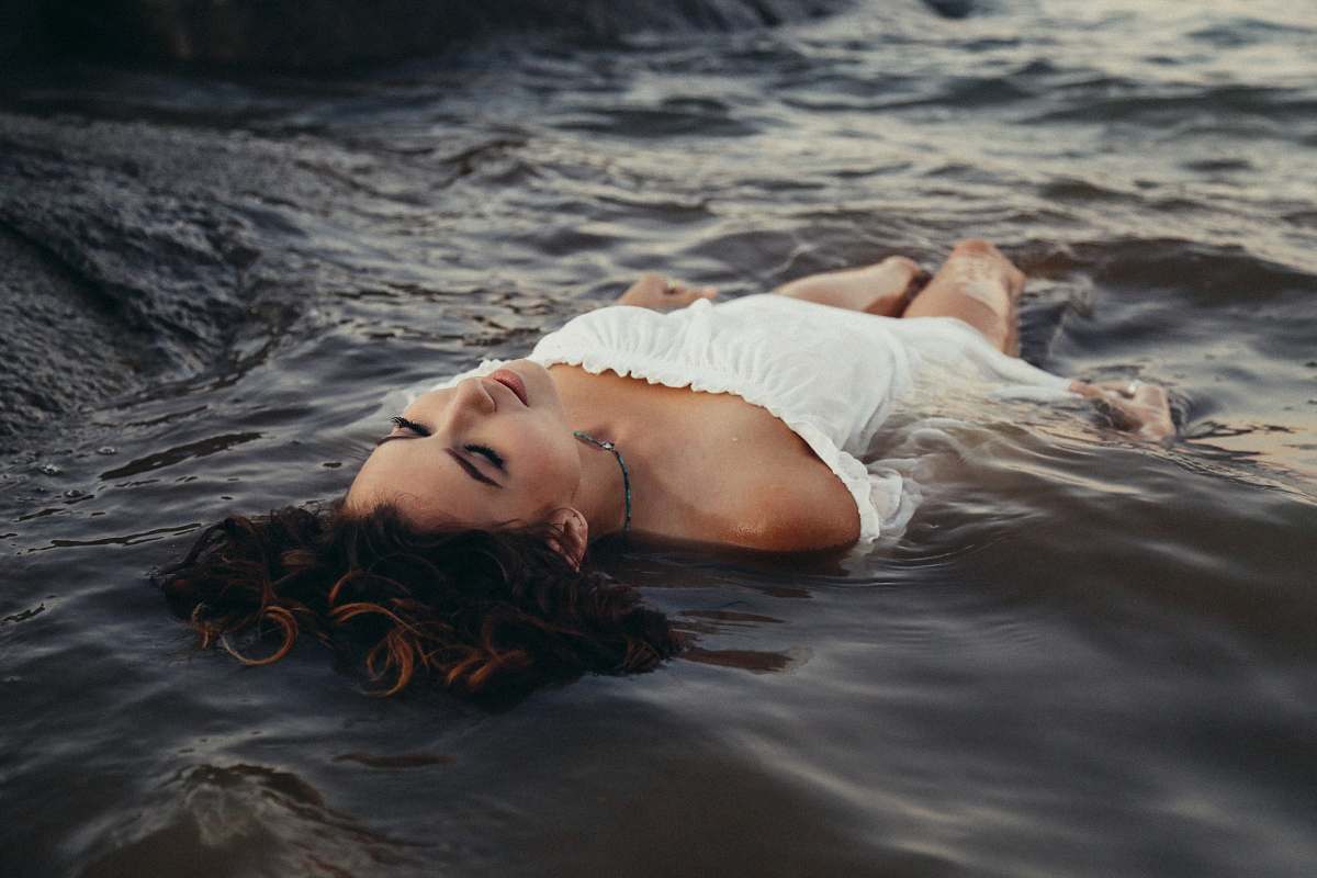 woman woman relaxing on body of water girl