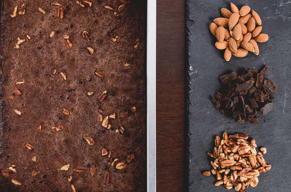 nut almond, peanuts, and chocolate on gray surface chocolate