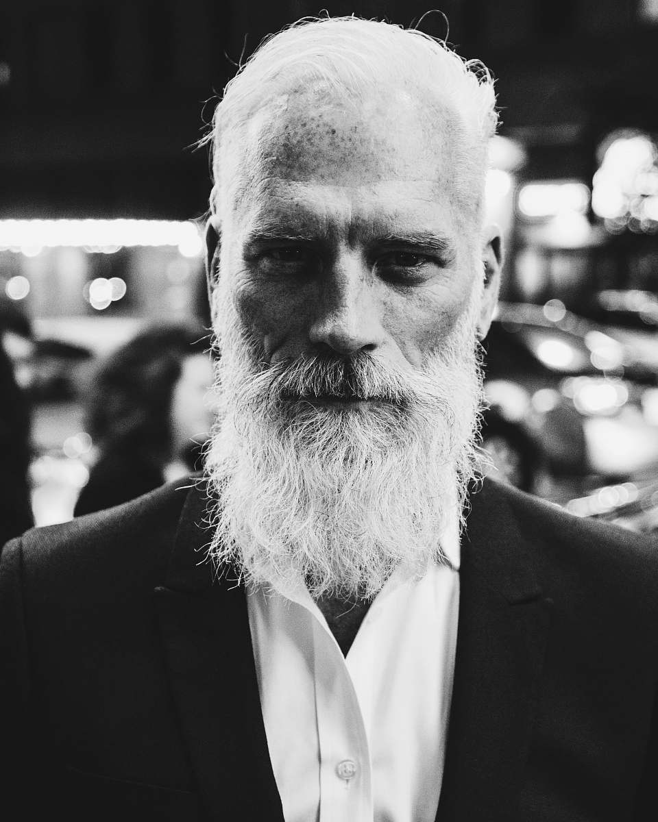 beard grayscale photo of bearded man white hair