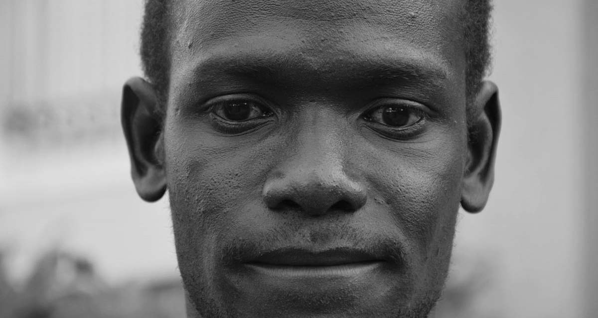 face grayscale photo of man face portrait