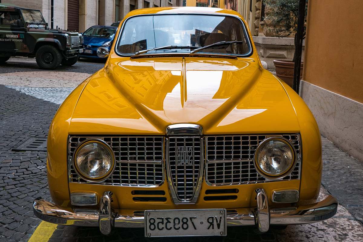 vehicle yellow car automobile