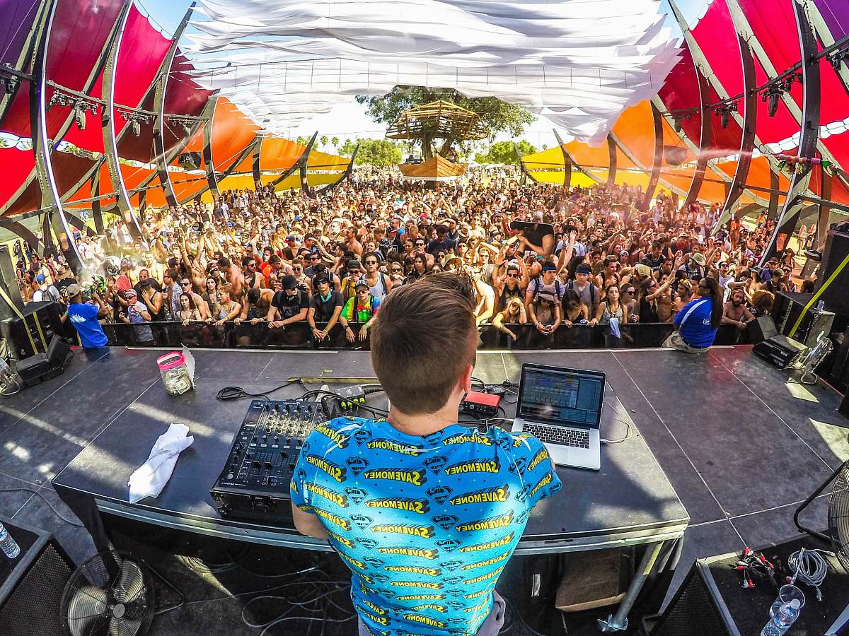 music DJ on stage in front of audience festival Image - Free Stock Photo