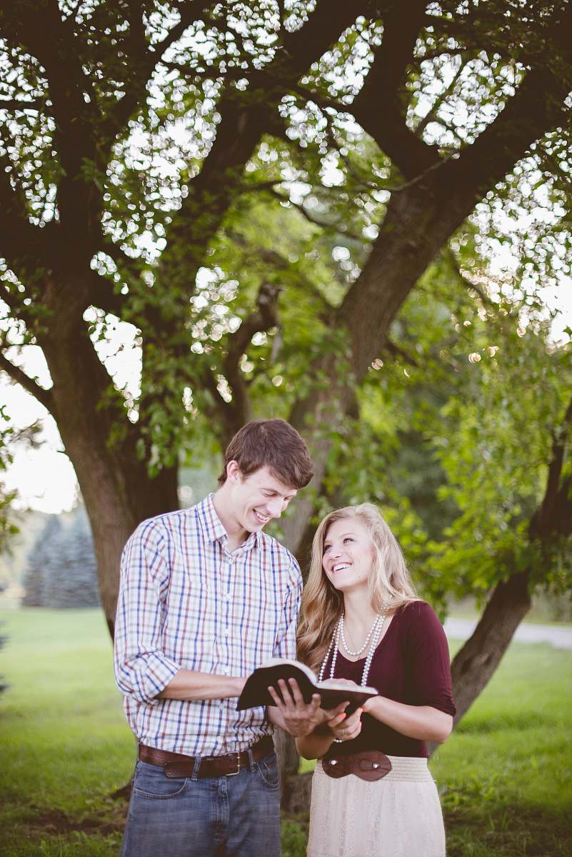 person couple under tree tree