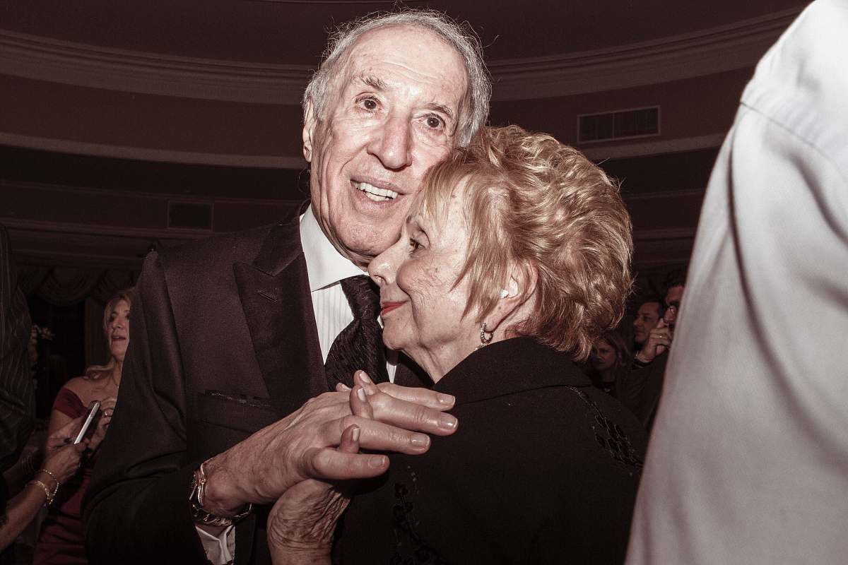 person man and woman in formal suit dancing suit