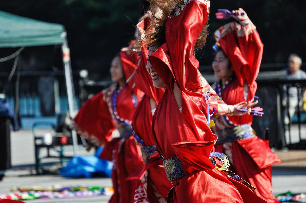 festival women's red and blue traditional dress crowd