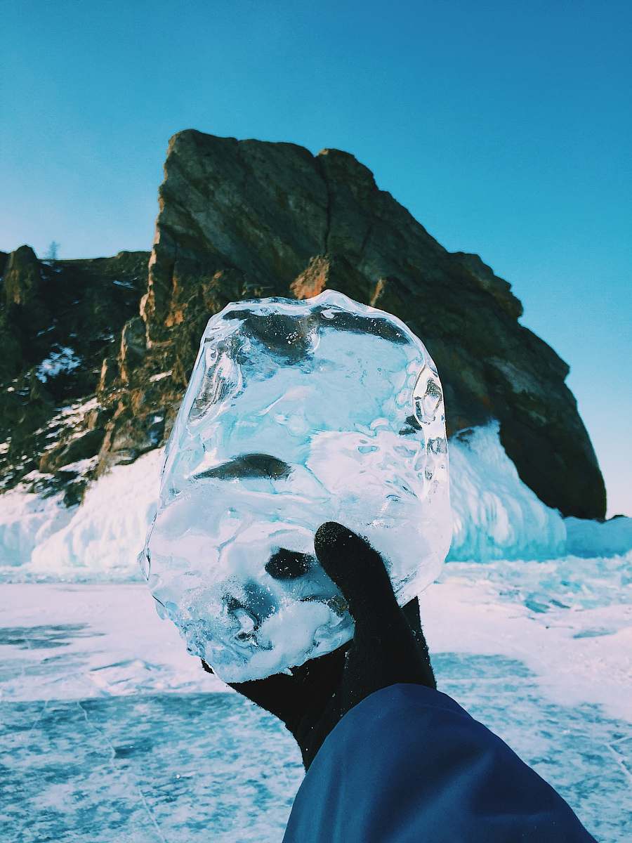 nature person holding ice outdoors