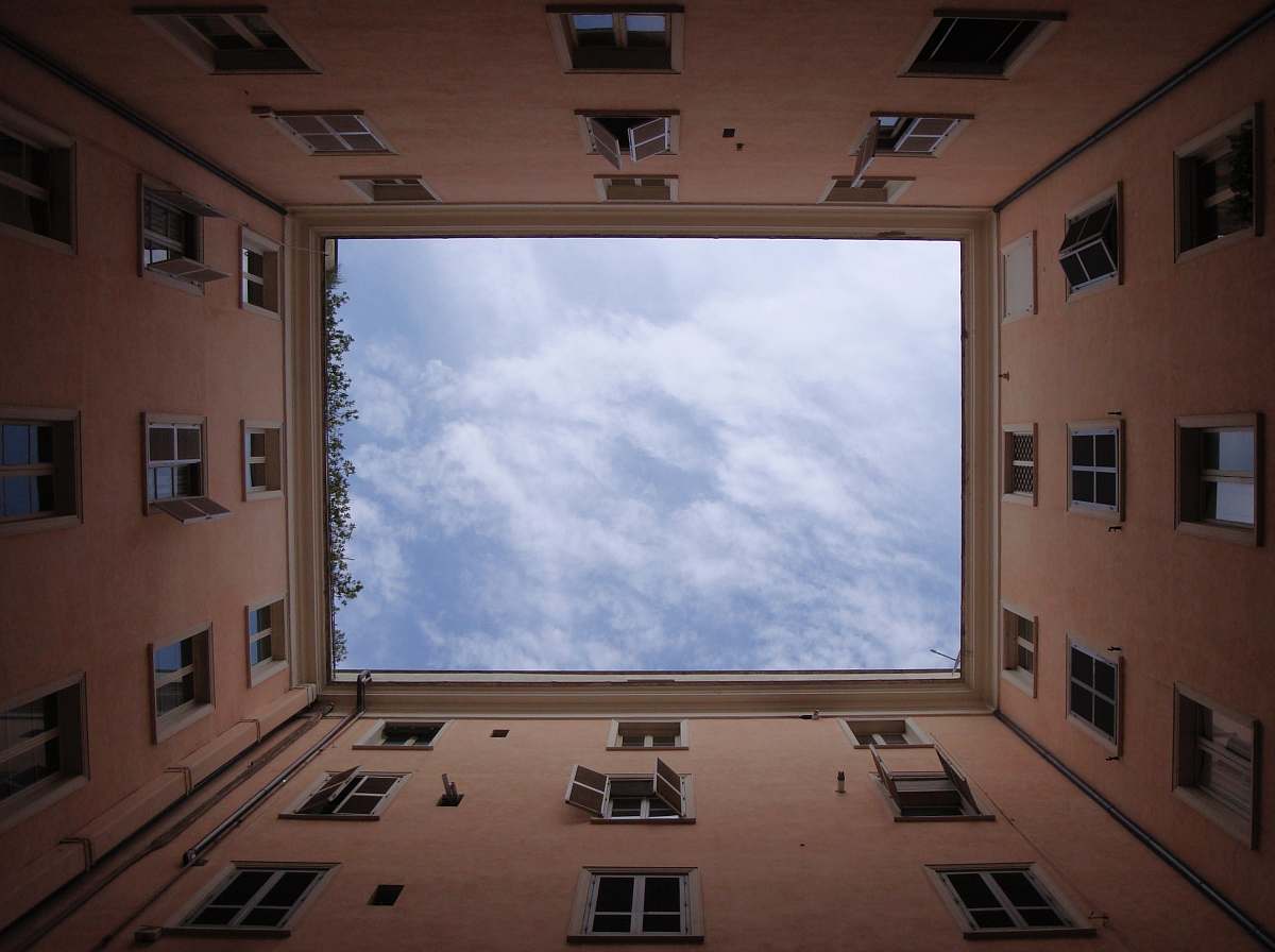 sky worms eyeview of buildings during daytime rome