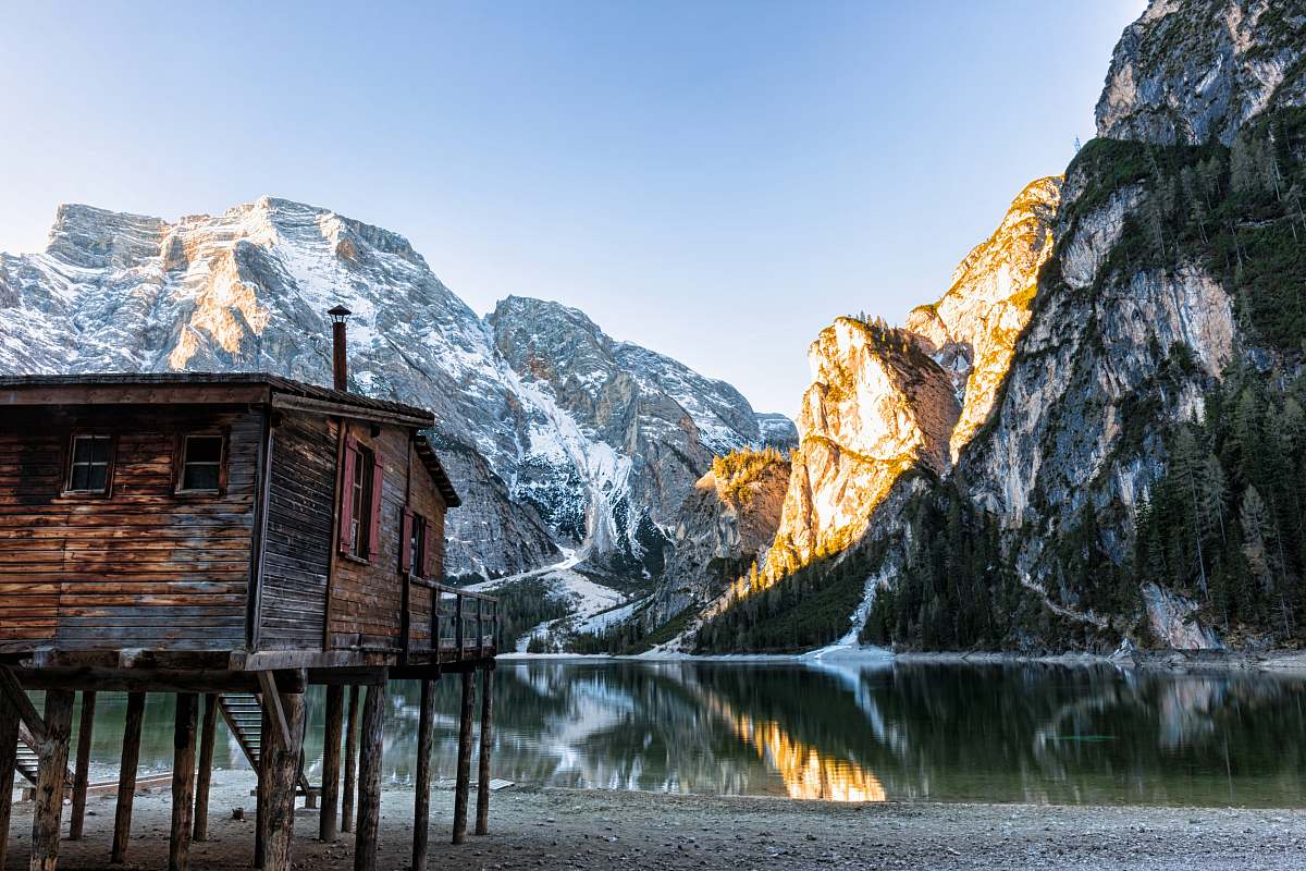 nature brown cabin beside lake cabin