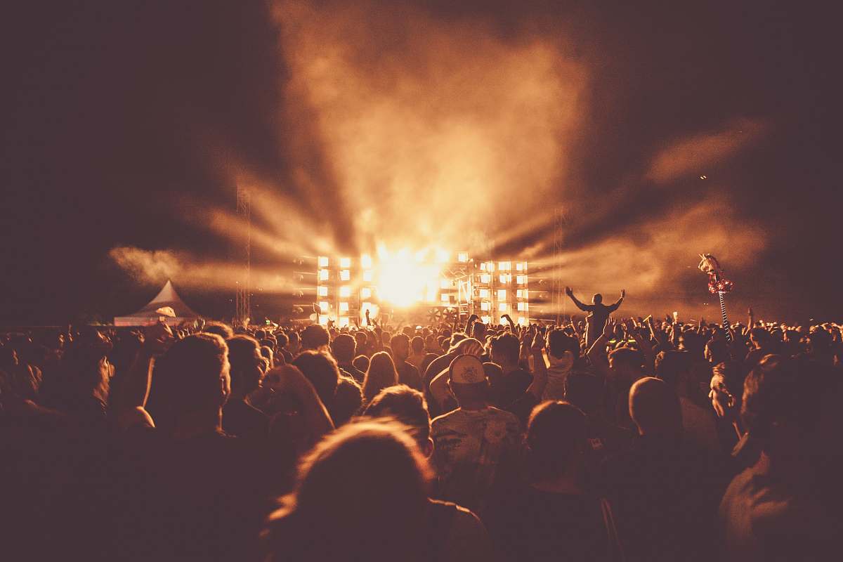 festival stage light front of audience crowd