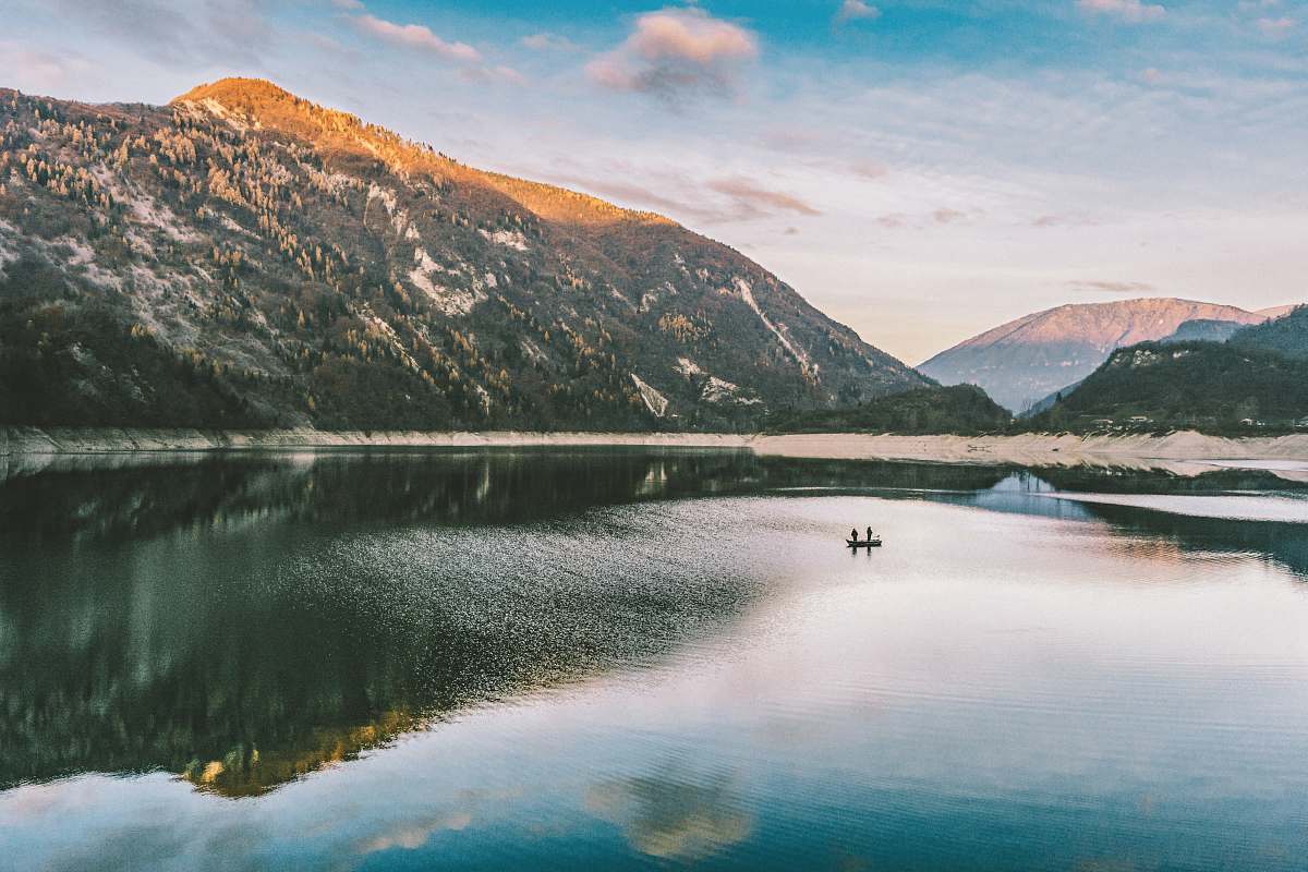 mountain landscape photography of mountain near body of water lake