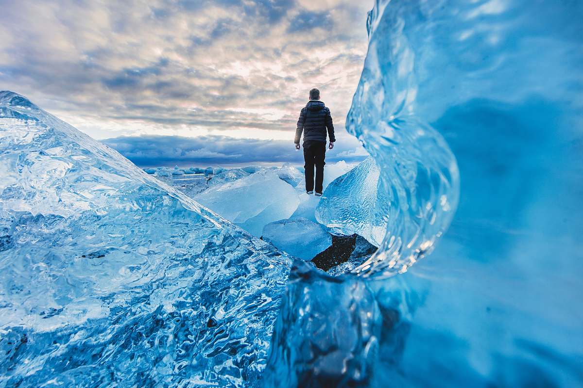 ice man floating on water photo edit wallpapers