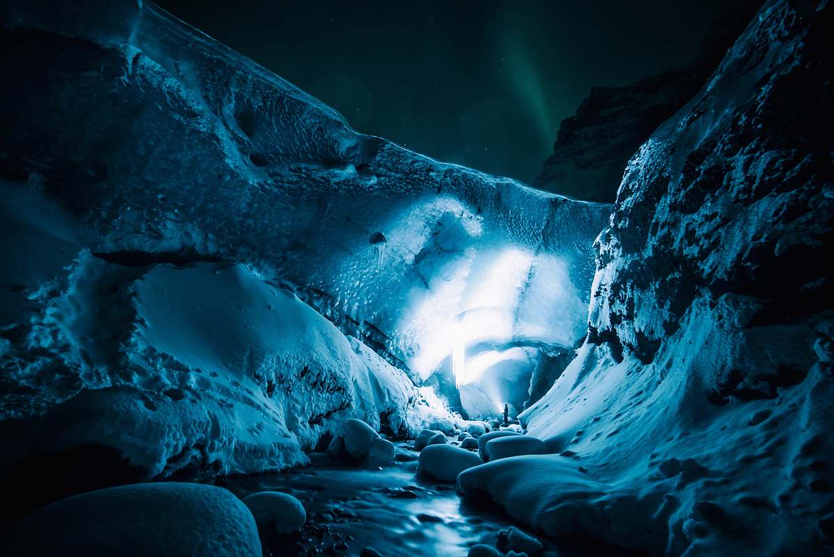 snow person on white cave ice