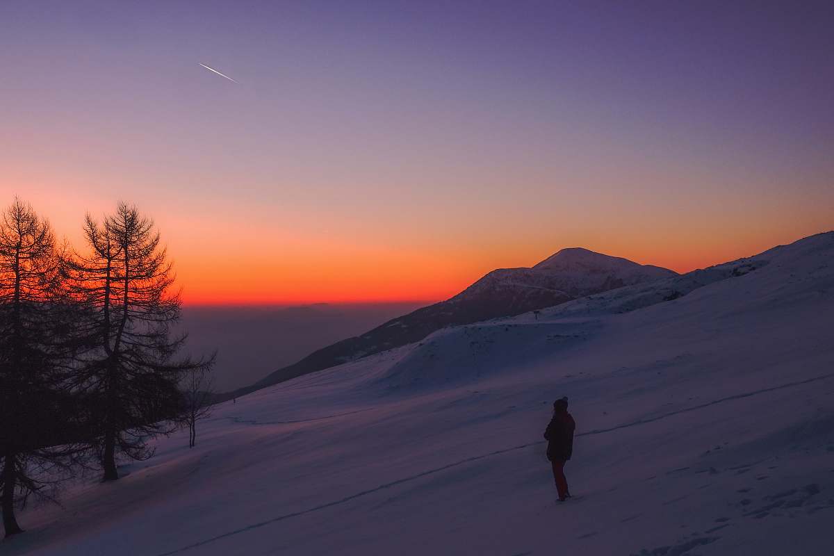 person person walking on ice mountain