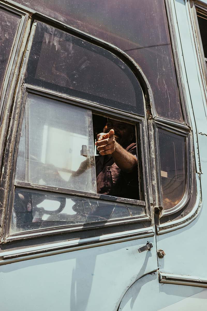 human man riding bus person