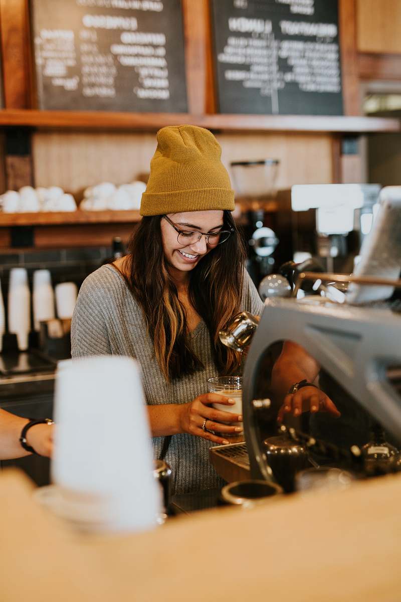 human woman holding clear drinking glass person