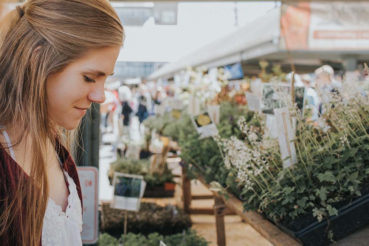 woman woman looking at plants female