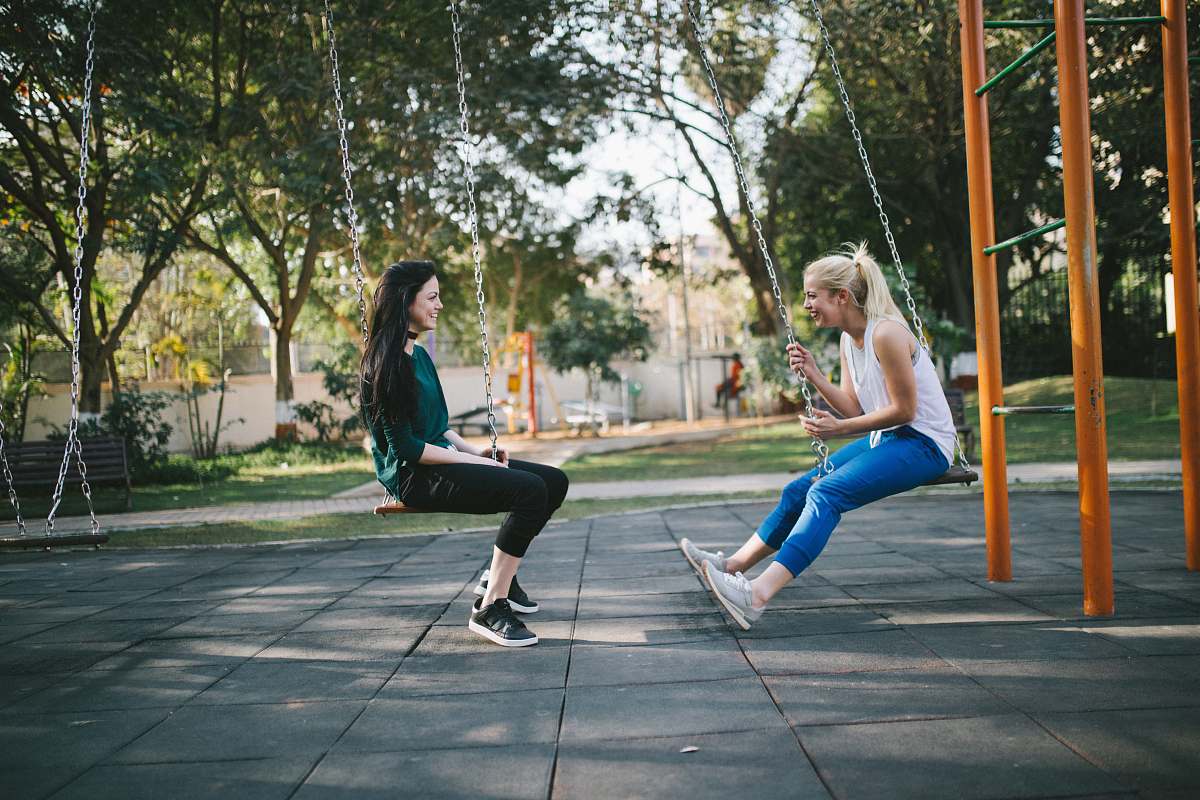 swing woman sitting on swing park