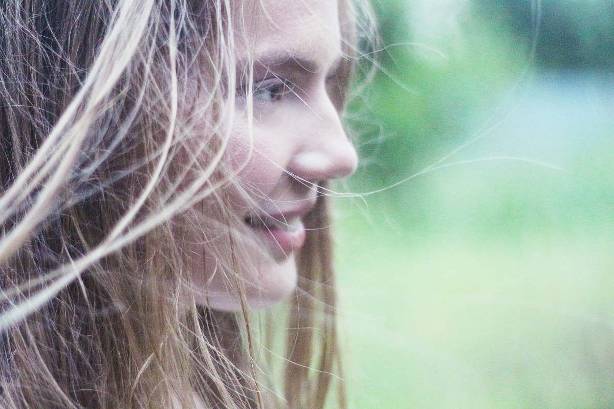 girl selective photo of woman's face face