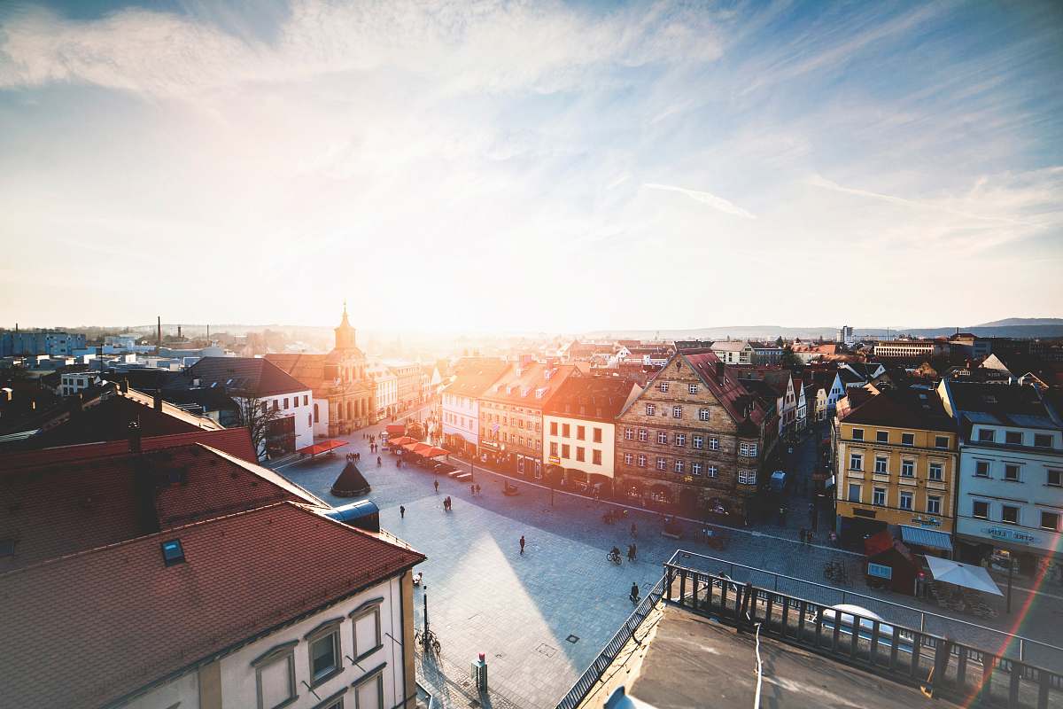 sky aerial photography of people walking near buildings urban