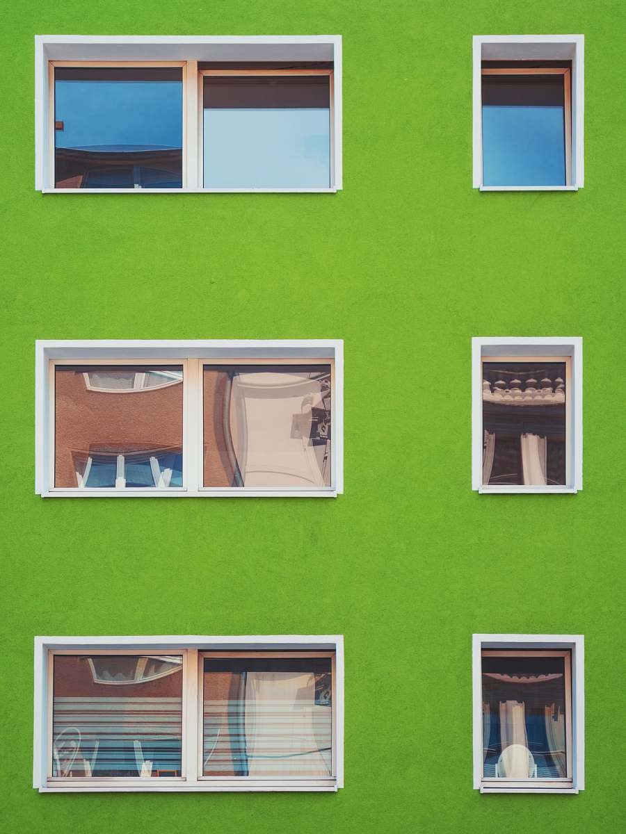 window architectural photography of green house with windows green