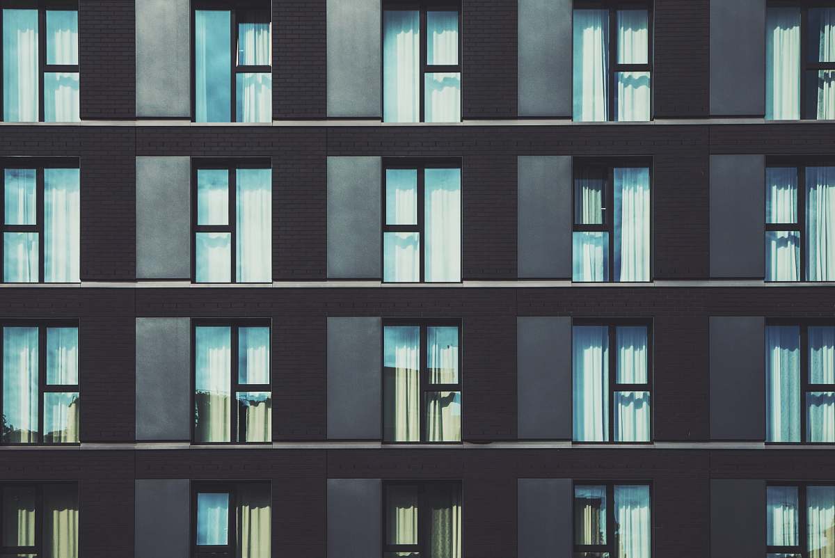 germany gray high-rise building with glass windows building