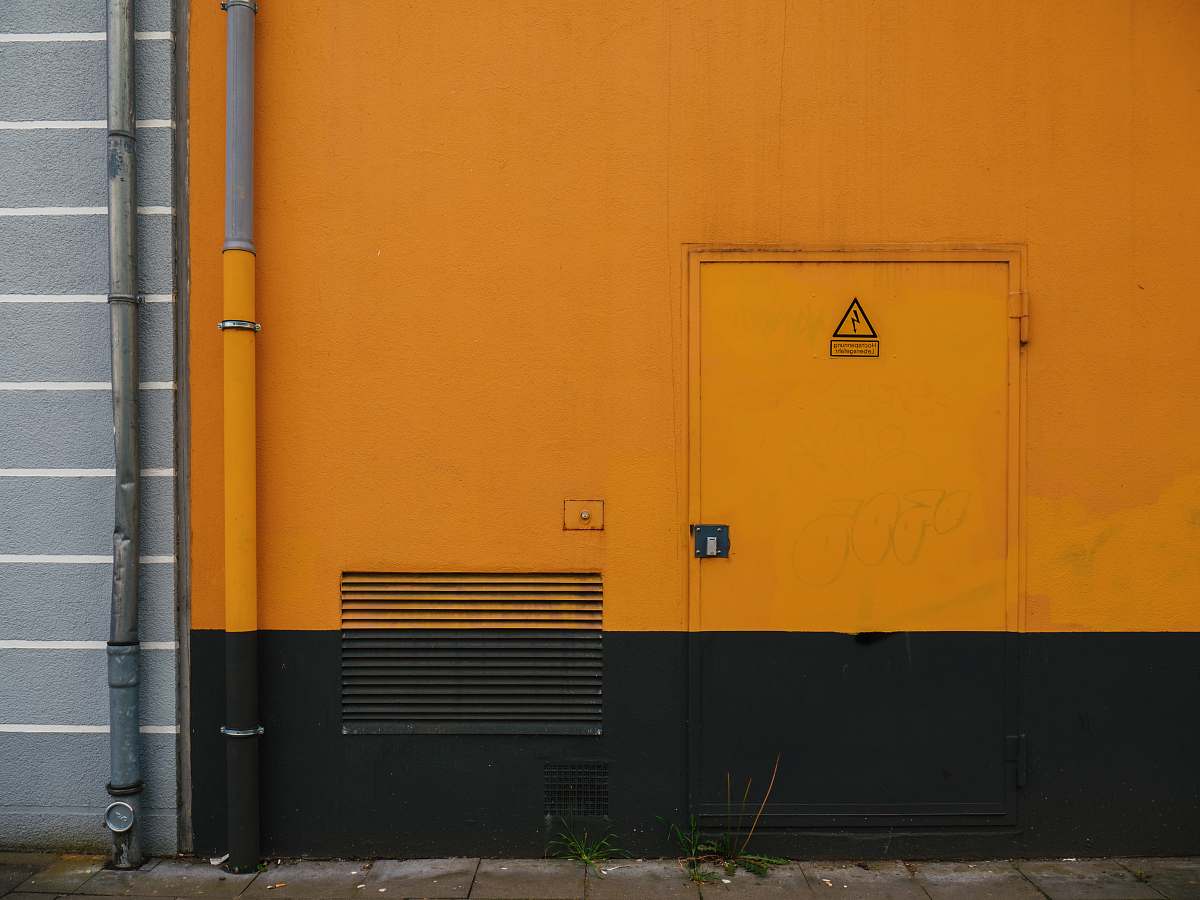 cologne yellow and black painted wall brown