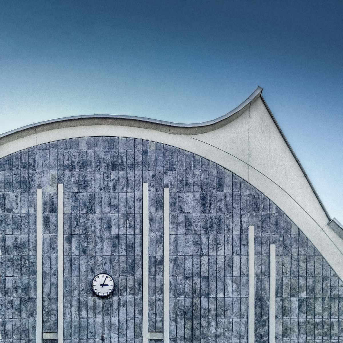 germany gray and white concrete wall with analog wall clock building
