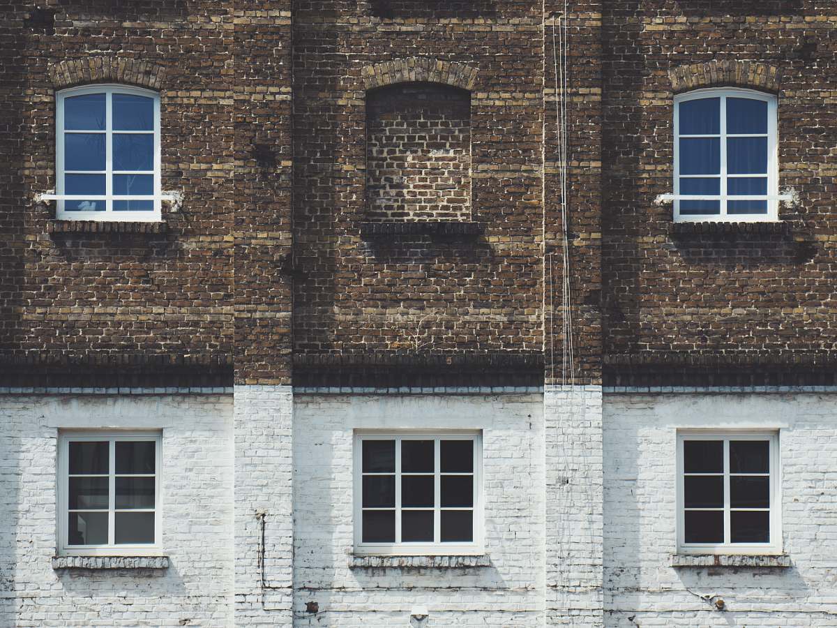 brick brown and white painted building house