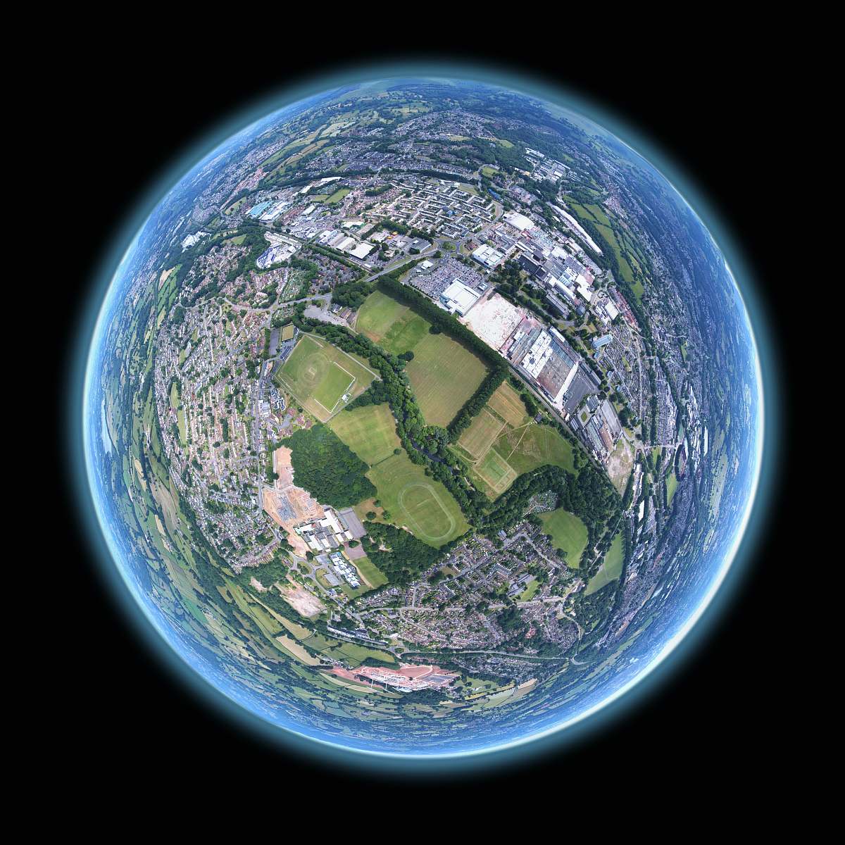 planet fish-eye aerial shot of buildings and trees sphere