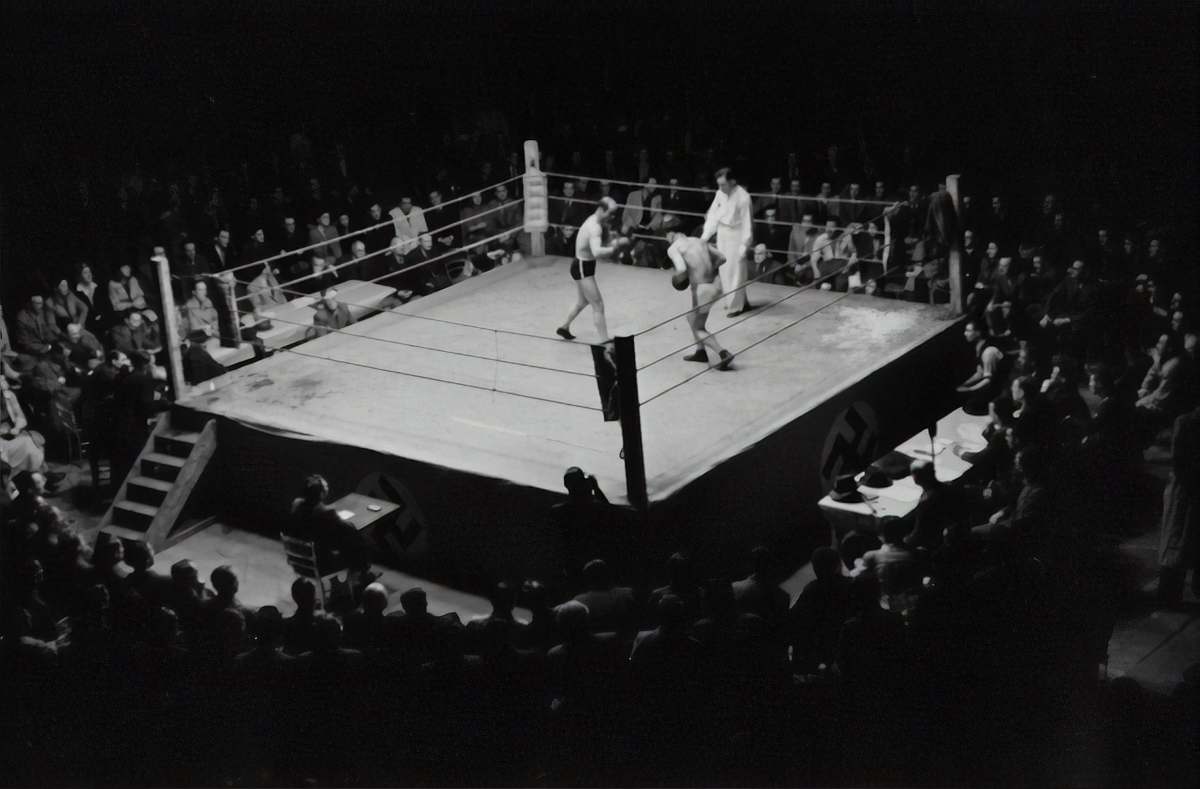 human grayscale photo of boxing game person