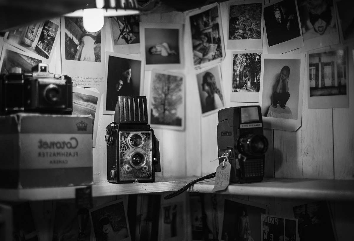 black-and-white grayscale photo of vintage camera shop